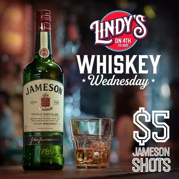A bottle of Jameson Irish Whiskey next to a glass with ice, advertising "Whiskey Wednesday" at Lindy's on 4th.