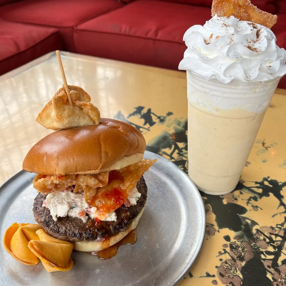 Lindy's on 4th burger with cream cheese, sweet chili, wontons, fortune cookies, and a milkshake.
